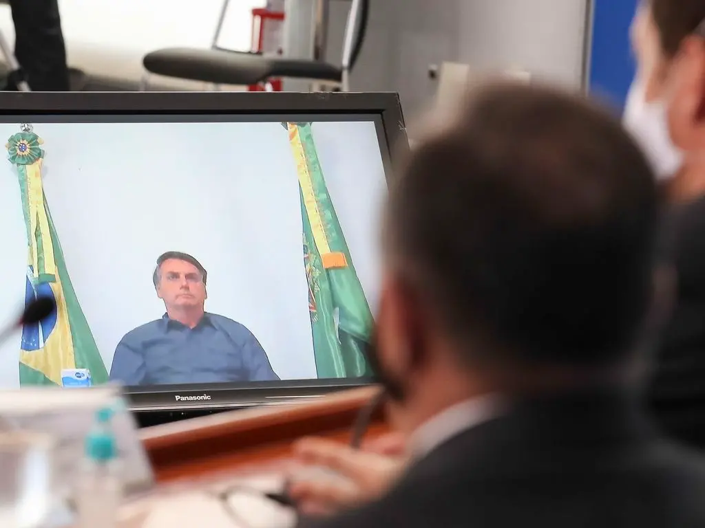 fotografia do presidente em videoconferência