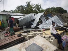 fotografia de casa destruída pelo furacão