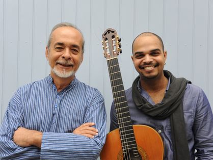 Esta é uma imagem do compositor e arranjador Gilson Peranzzetta e o violonista Marcel Powell