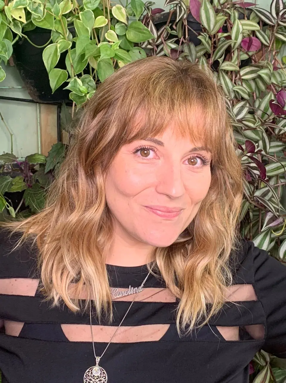 Esta é uma imagem de um corte de cabelo com franja