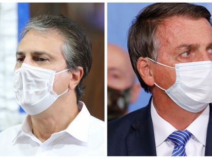 Camilo Santana à esquerda e Jair Bolsonaro à direita, ambos de máscara