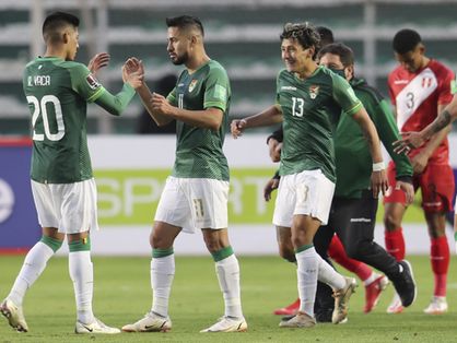 Jogadores da Bolívia comemorando última vitória