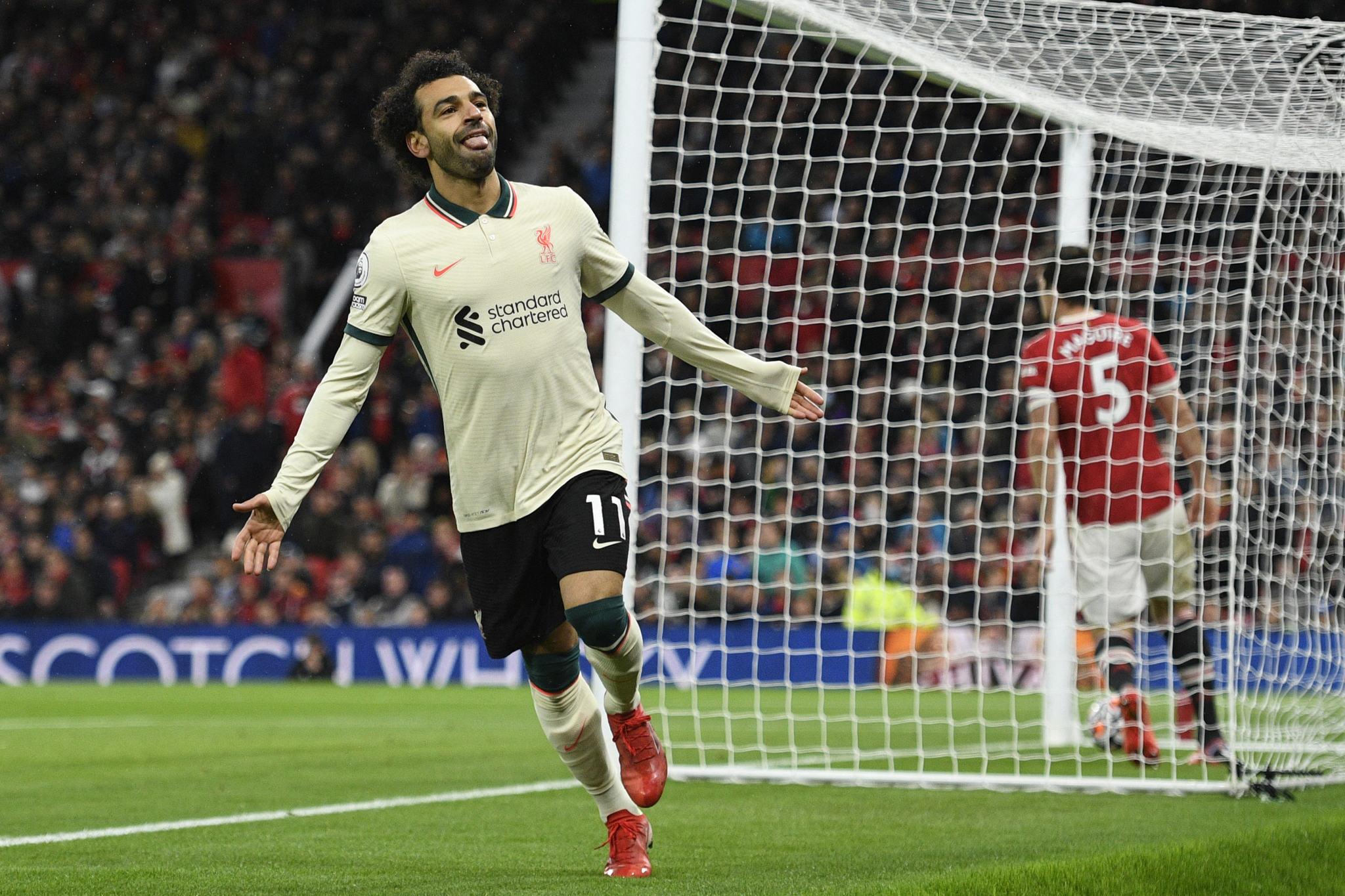 Salah comemora gols contra o Manchester United