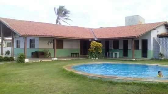 Casa de veraneio com piscina na Praia do Presídio.