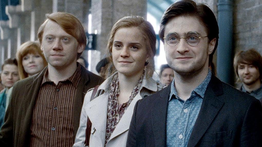 Daniel Radcliffe, Rupert Grint e Emma Watson como, respetivamente, Harry Potter, Ron Weasley e Hermione Granger