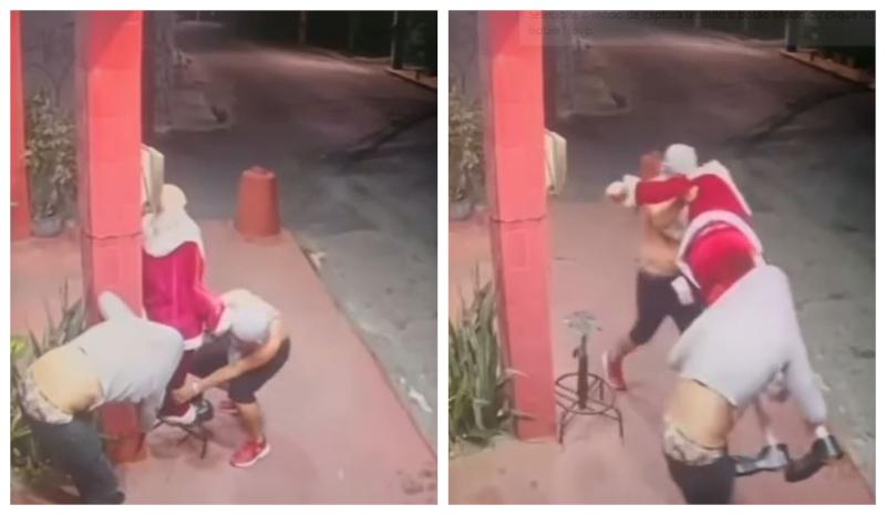 Imagens mostram o momento em que dois suspeitos com camisas escondendo o rosto levam o item de decoração