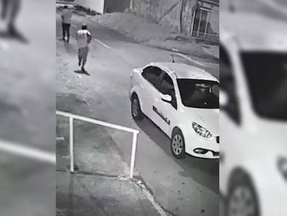 Frame de vídeo em que taxista reage a assalto no Distrito Federal