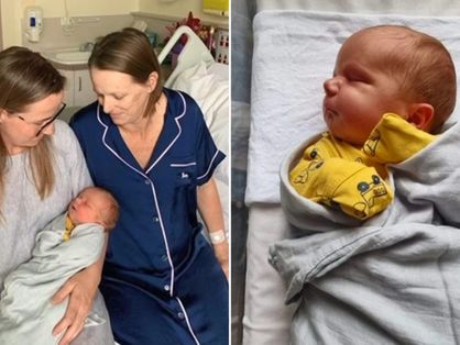 A avó horas depois do parto e o neto desejado no hospital da Tasmânia.