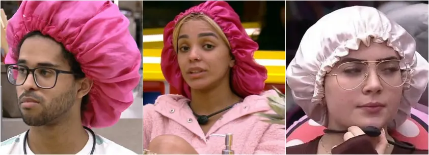 Luciano, Bruna e Jade usam as toucas de cetim dentro do reality show