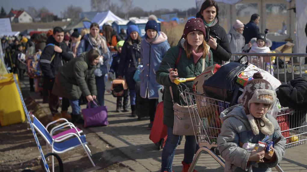 Refugiados ucranianos na fronteira com a Polônia