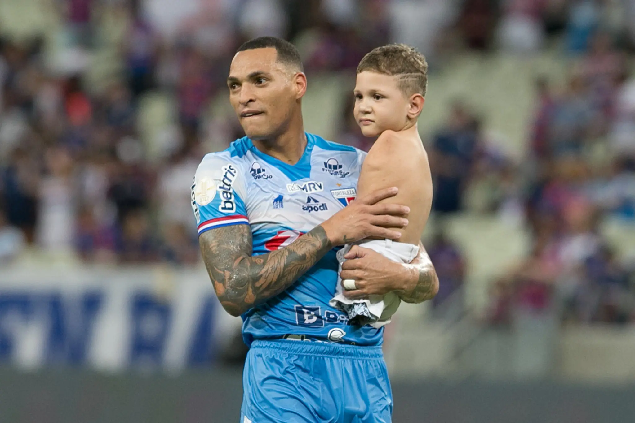 Titi com o garoto Miguel