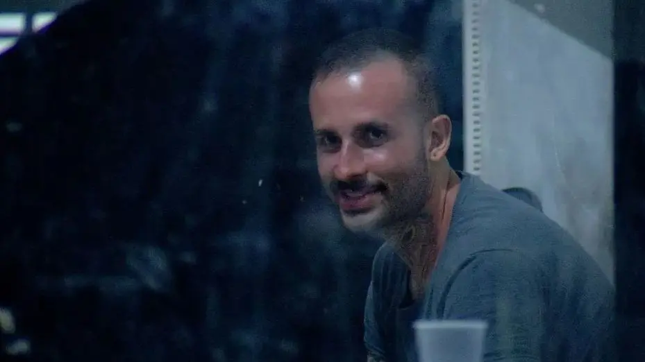 Esta imagem mostra ruan pamponet sorrindo após ser preso em tocantins