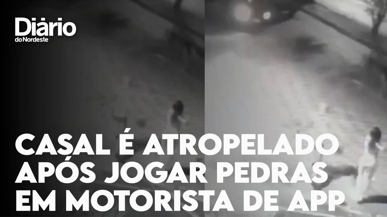 Captura de tela de vídeo com casal atirando pedras em carro de motorista de aplicativo. Na imagem, há um letreiro com a frase 