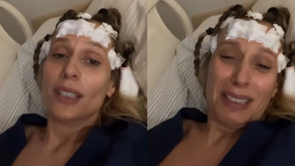 Luisa Mell chorando internada em cama de hospital