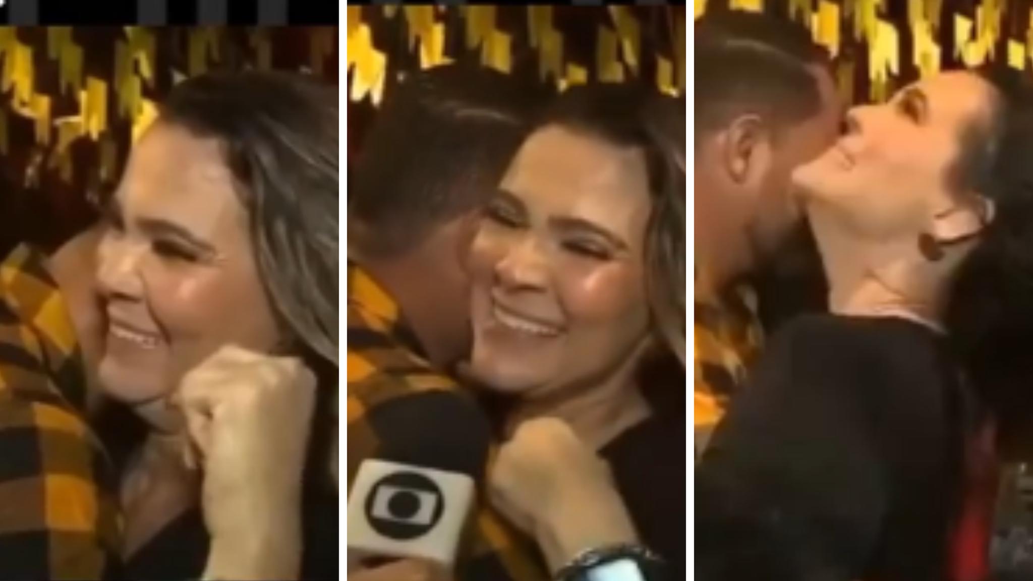 Homem esconde rosto enquanto dança com mulher