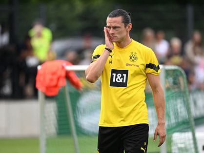 Nico Schulz em ação durante jogo do Borussia Dortmund
