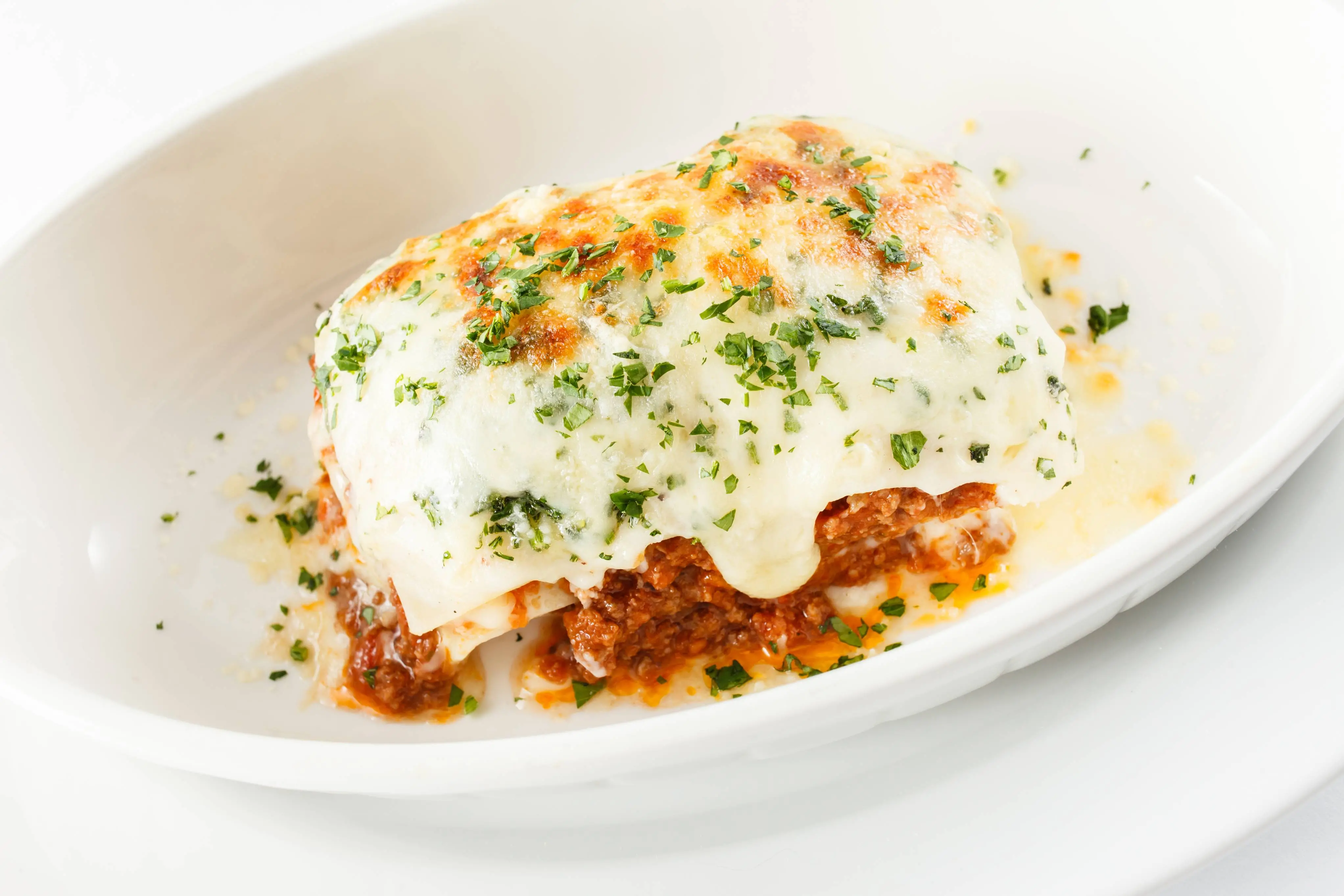Imagem de uma lasanha ao molho branco
