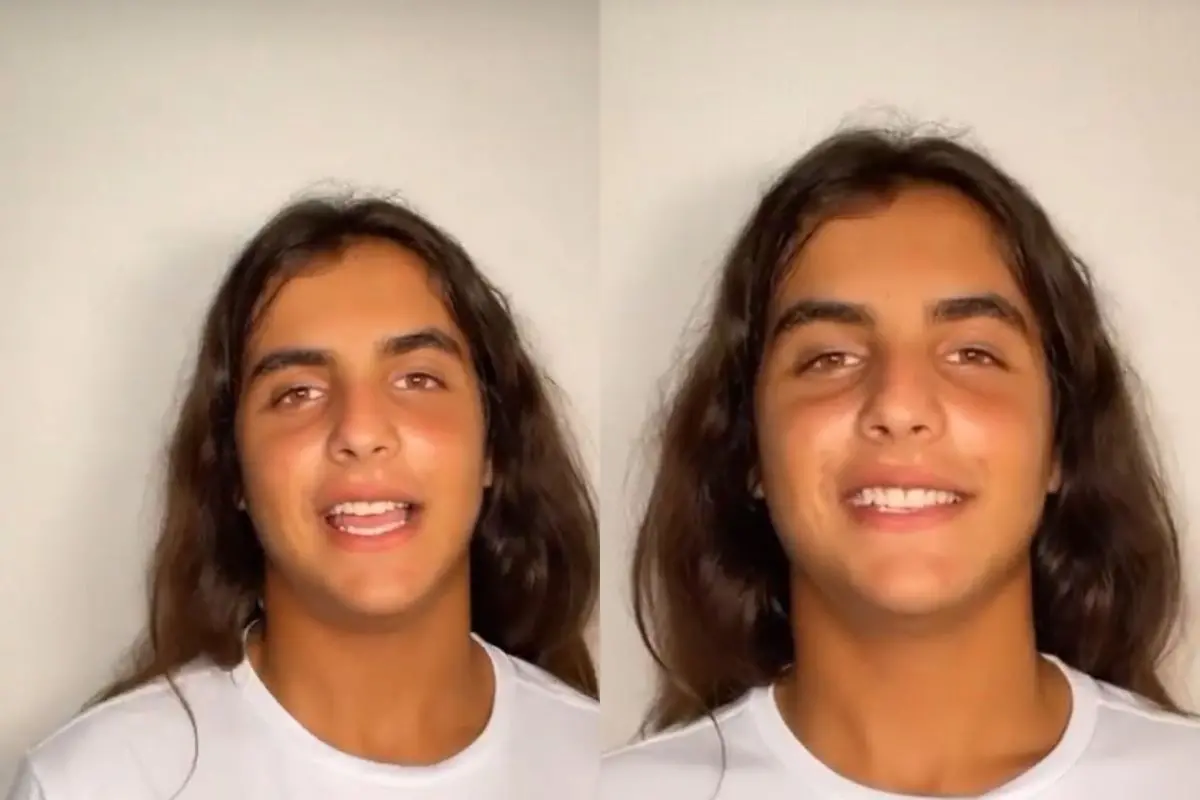 Marcelo Sangalo com cabelo grandes em vídeo antes de cortar