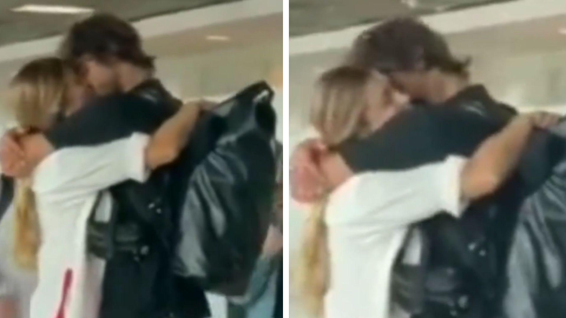 Grazi Massafera e Marlon Teixeira se beijam em aeroporto