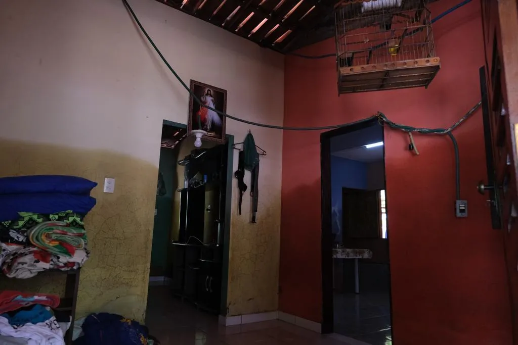 Impacto das chuvas na casa de dona Maria