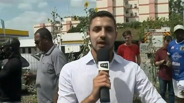 repórter ao vivo durante cobertura do ataque a creche em Blumenau