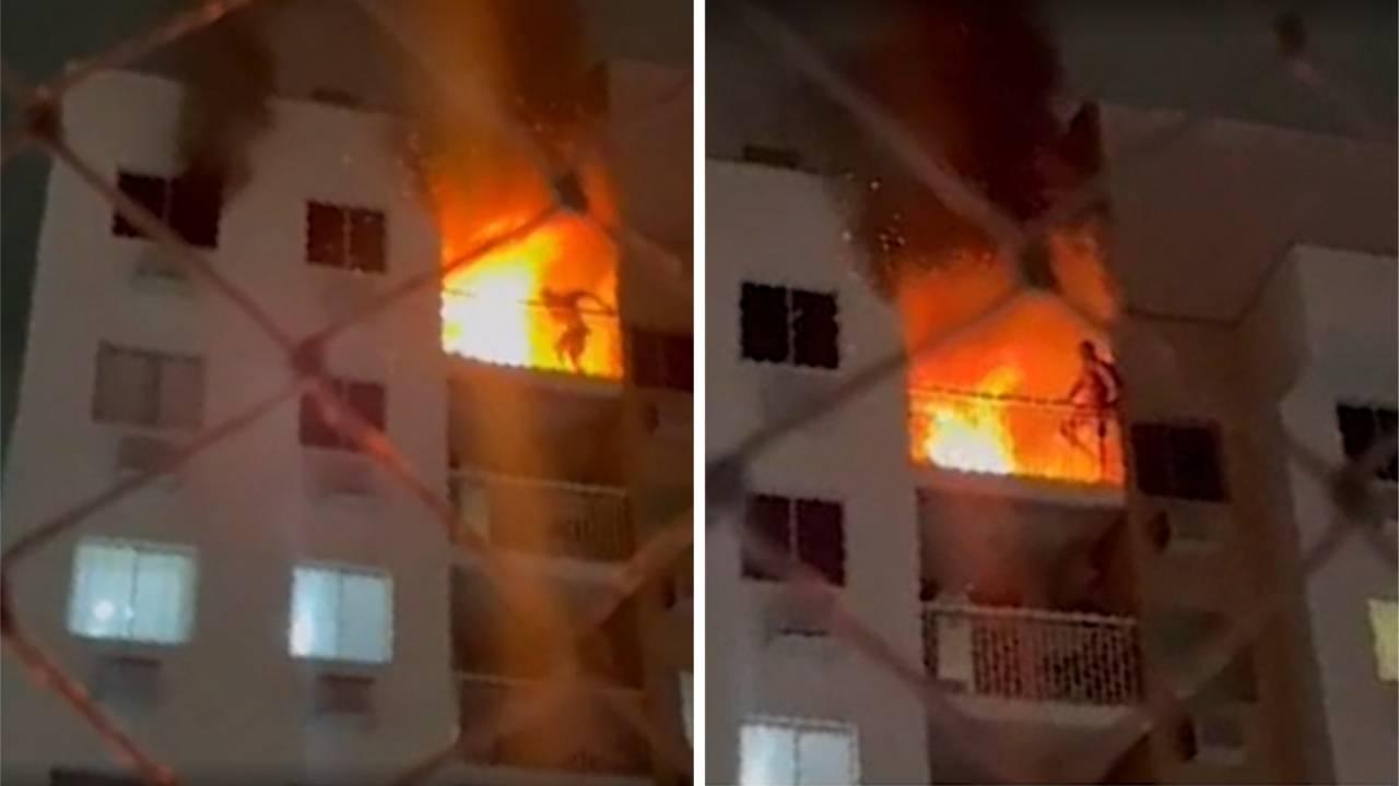 Imagem mostra fisiculturista Hugo Sérgio Andrade do Nascimento gritando por socorro e tentando pular da varanda do seu apartamento em chamas no Anil, Zona Oeste do Rio de Janeiro, durante a madrugada de 29 de julho. Homem morreu na ocasião.