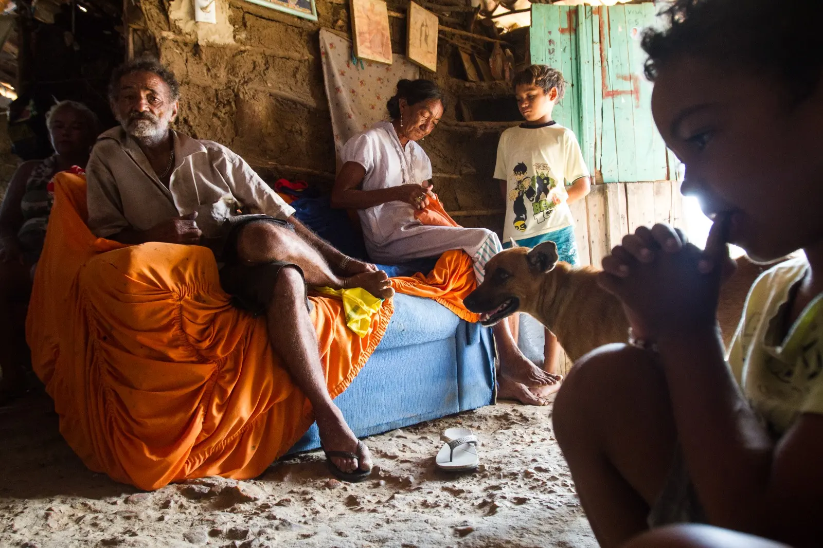 Família casa de barro