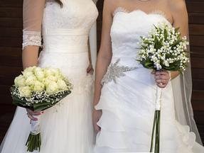 Imagem mostra silhueta de duas mulheres vestidas de noivas em casamento homoafetivo. Proibição de união entre pessoas do mesmo sexo é analisada por comissão da Câmara dos Deputados, em votação realizada em 19 de setembro de 2023