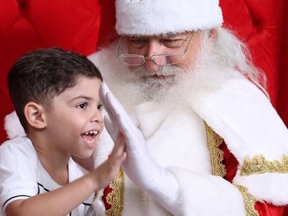 Léo com Papai Noel