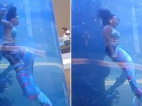 Sereia profissional fica presa em aquário de shopping e tenta fugir de afogamento