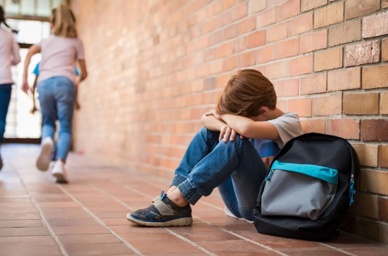 Criança sofrendo bullying
