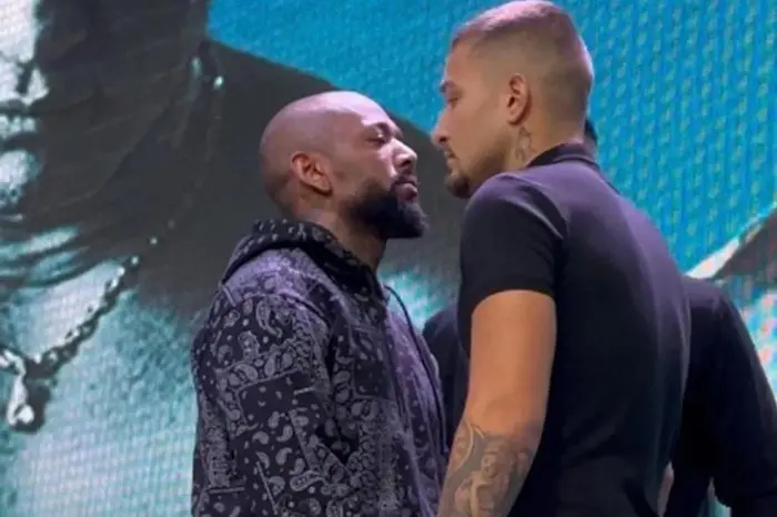 Nego do Borel e MC Gui se encarando para a luta