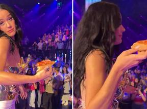 Katy Perry é criticada por jogar fatia de pizza na plateia