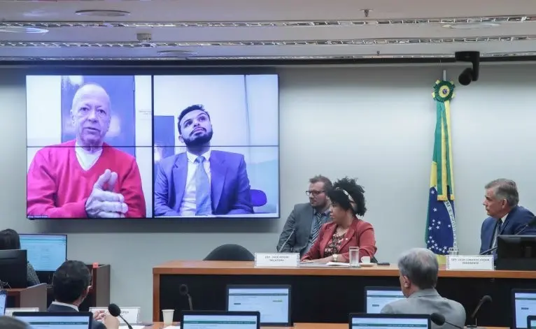 Deputada Jack Rocha (PT-ES) em audiência com Chiquinho Brazão, que se defendeu por vídeo