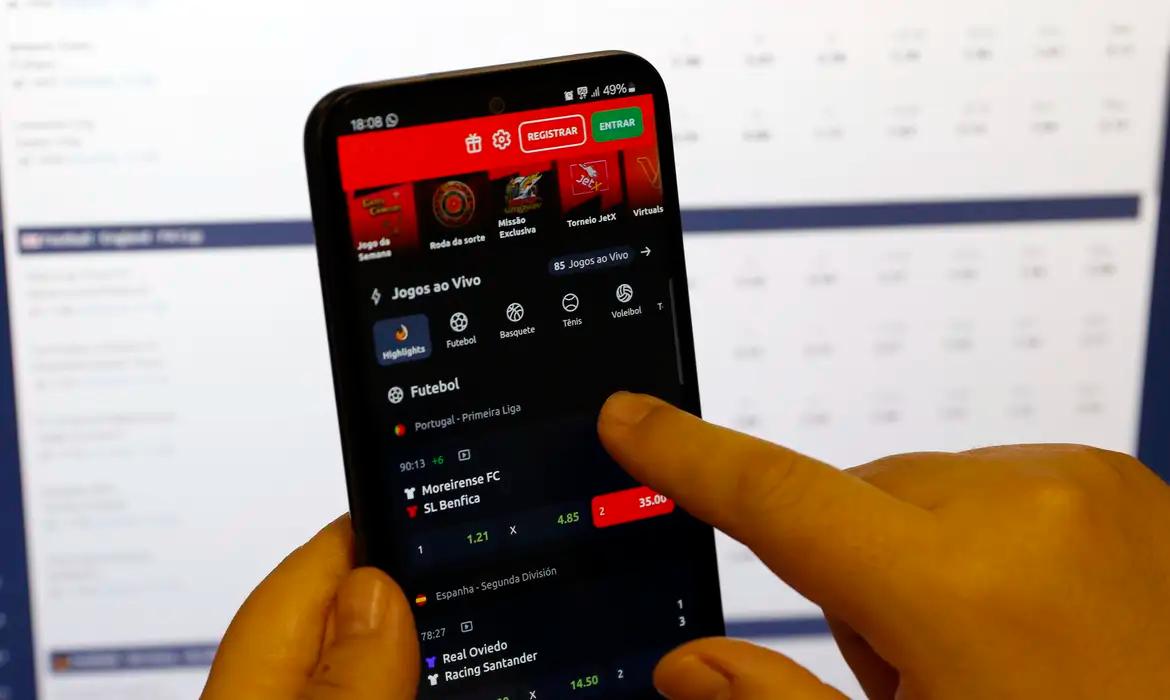 Celular com apostas esportivas