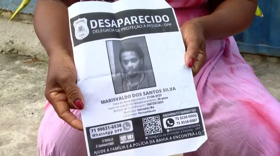 Cartaz de desaparecido com informações sobre Marisvaldo dos Santos Silva, incluindo dados de contato e registro policial.