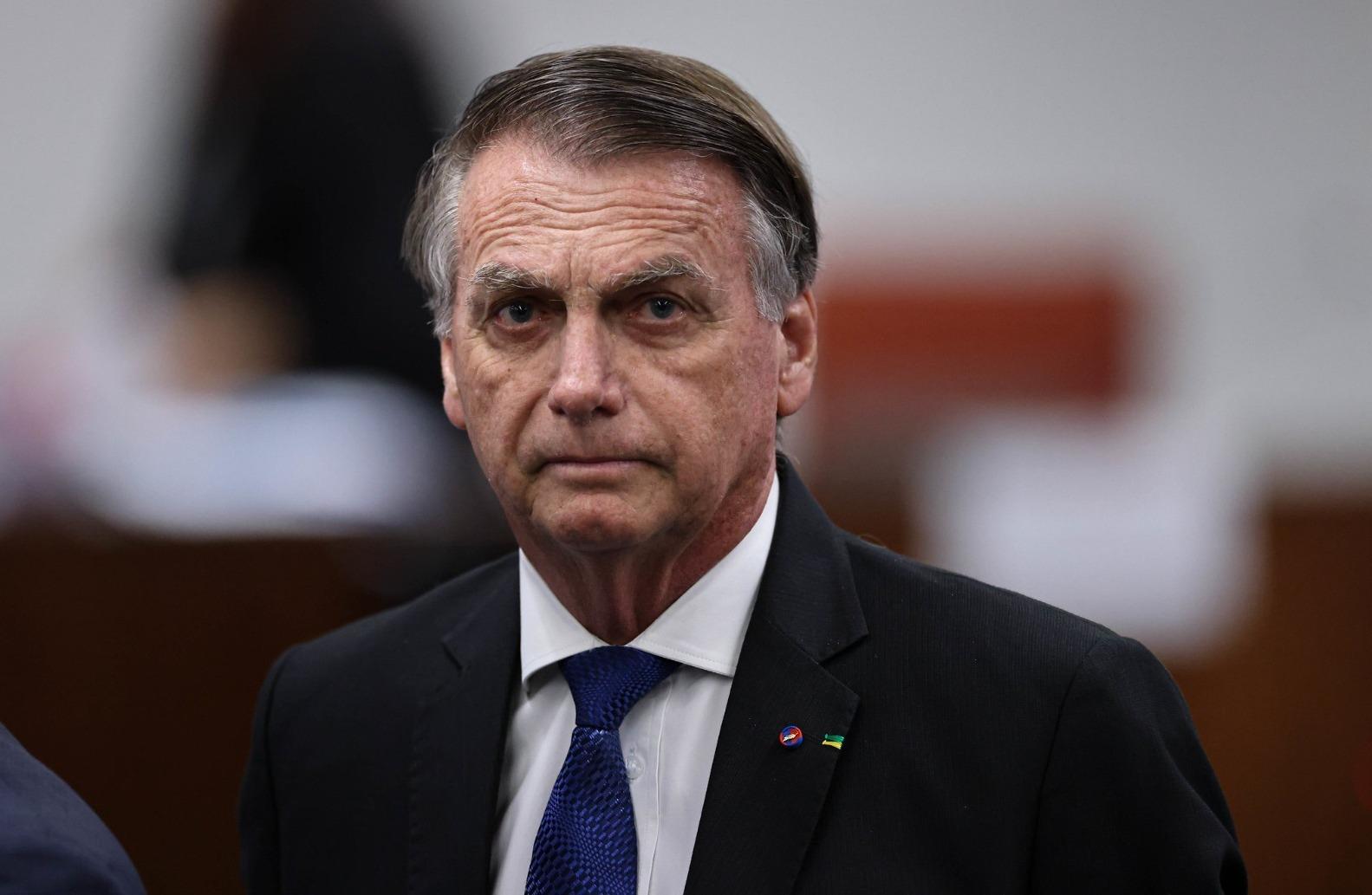 Bolsonaro com expressão séria durante interrogatório no STF