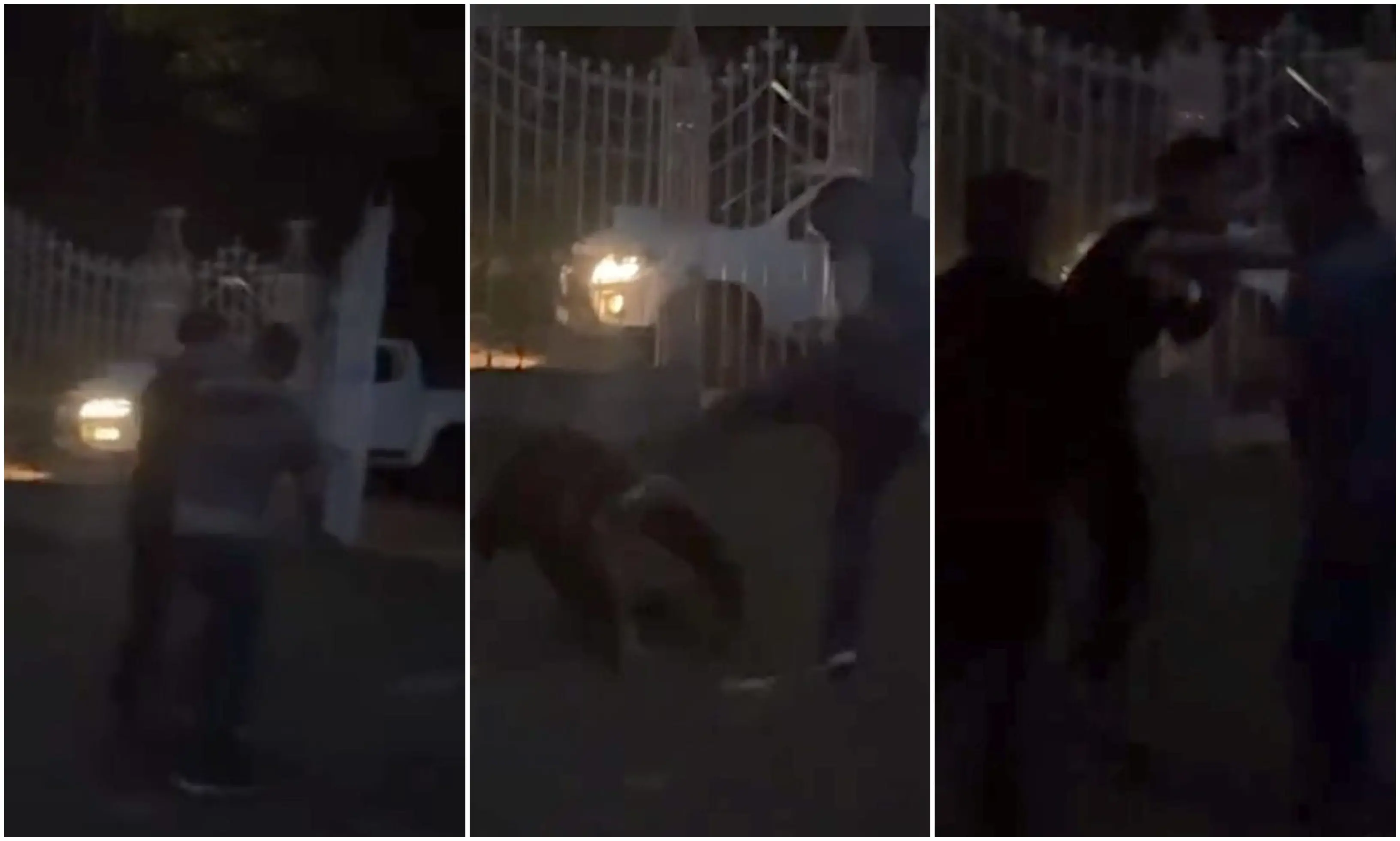 Três quadros mostram uma briga noturna em frente a um portão de grades metálicas, com um carro branco iluminado ao fundo. No primeiro quadro, duas pessoas parecem se aproximar ou discutir. No segundo, uma pessoa no chão é chutada por outra. No terceiro, duas pessoas continuam trocando golpes enquanto uma terceira tenta intervir.