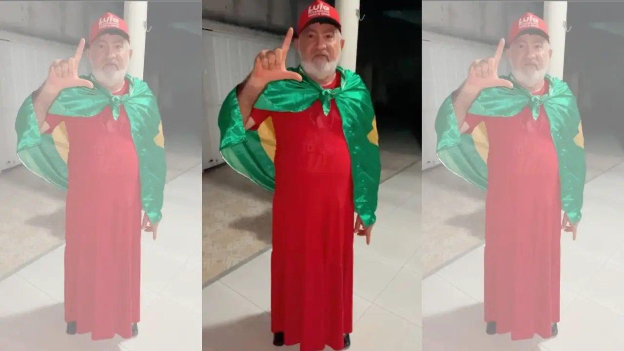 Vereador Carlos da Bodega com vestido vermelho