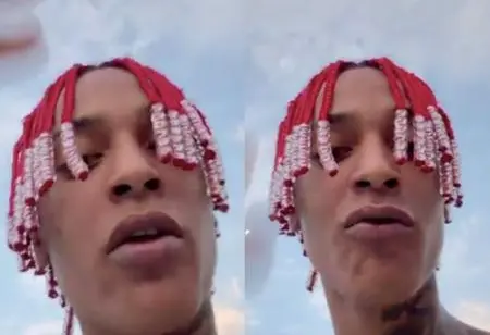 Oruam com tranças gravando vídeo para as redes sociais.