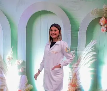 ana vitima estudante jaleco branco foto posada.