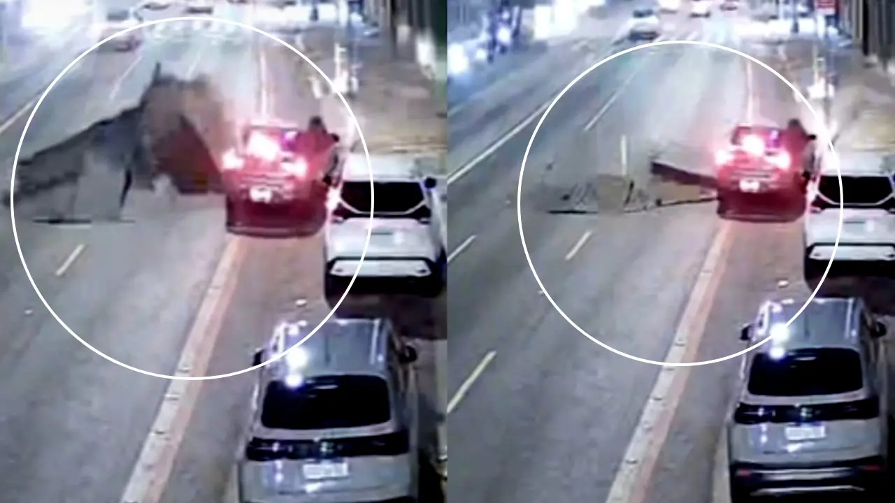 Câmeras de segurança registraram o momento em que o asfalto se eleva após um forte estrondo.