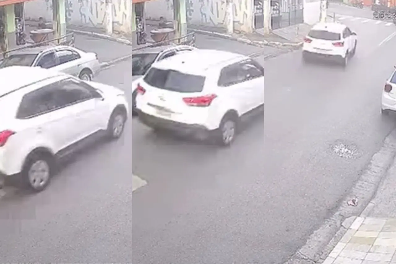 Captura de câmera de segurança mostrando carro em alta velocidade antes de bater em muro de casa na cidade de Diadema, São Paulo.