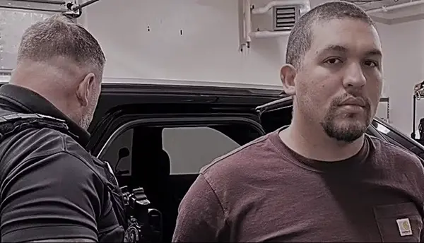 preso foto ice ex-pm foto carro ao fundo.