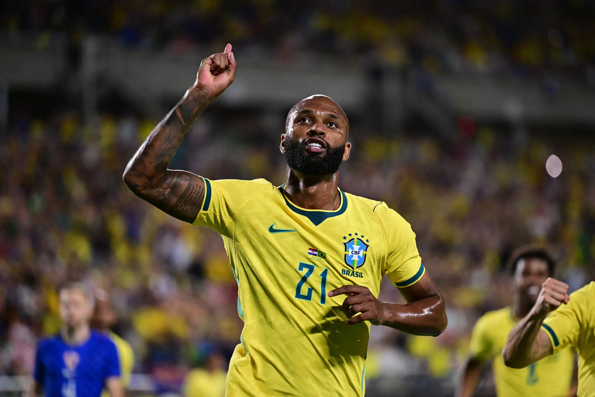 Foto de Igor Thiago comemorando gol pela Seleção Brasileira