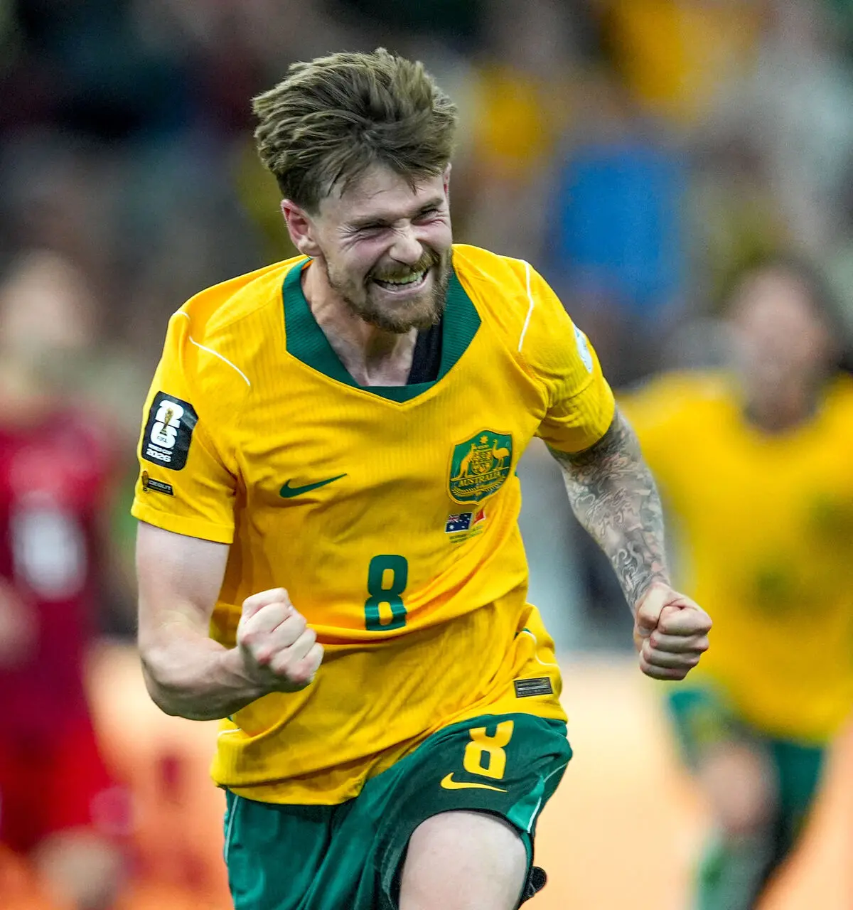 Atleta da Austrália celebra gol na Copa do Mundo