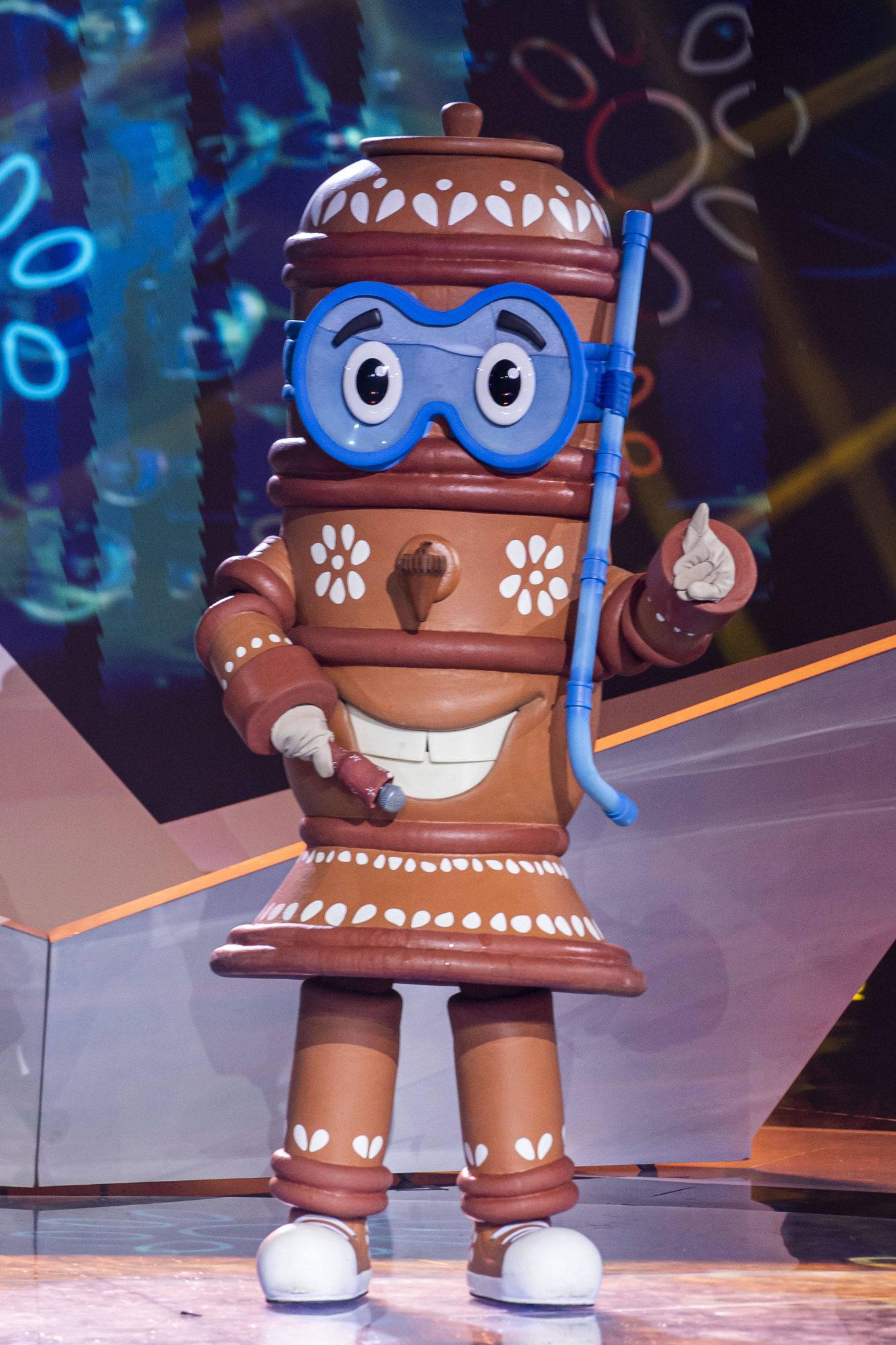 esta é uma imagem do filtro de barro 'the masked singer Brasil'