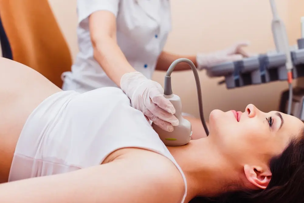 Mulher grávida tireódie