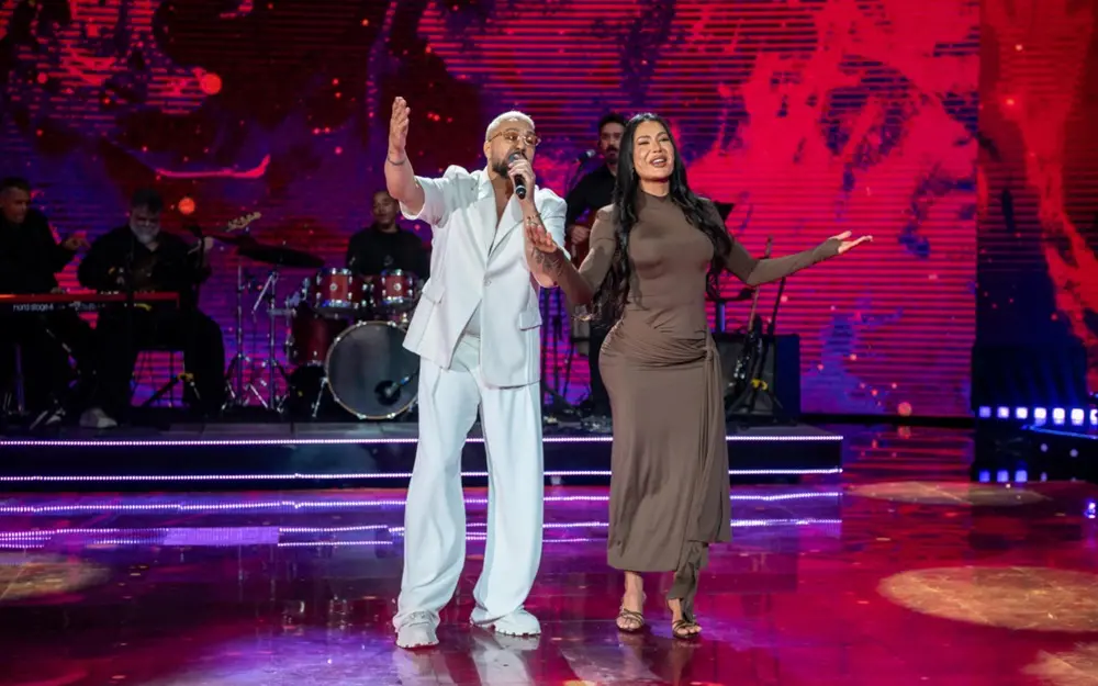 Belo cantou a música 