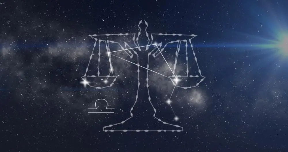 Escala zodiacal da Libra ilustrada no espaço, com estrelas formando o símbolo clássico da balança, representando equilíbrio e justiça na astrologia.